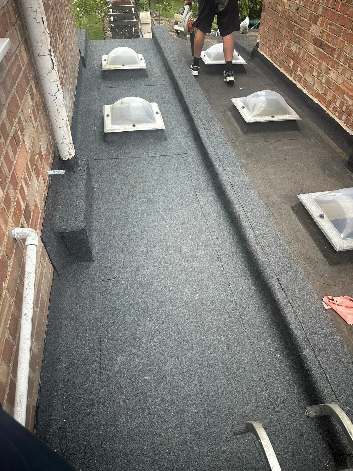 New felt flat roof with roof lights