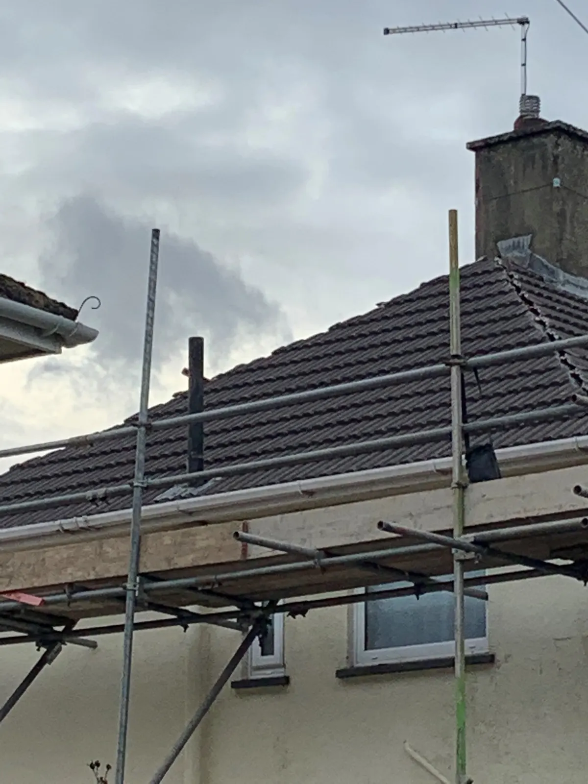 New tiled roof with scaffolding in place