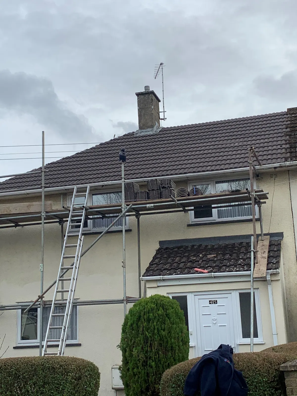 Re roofed semi detached house with scaffolding